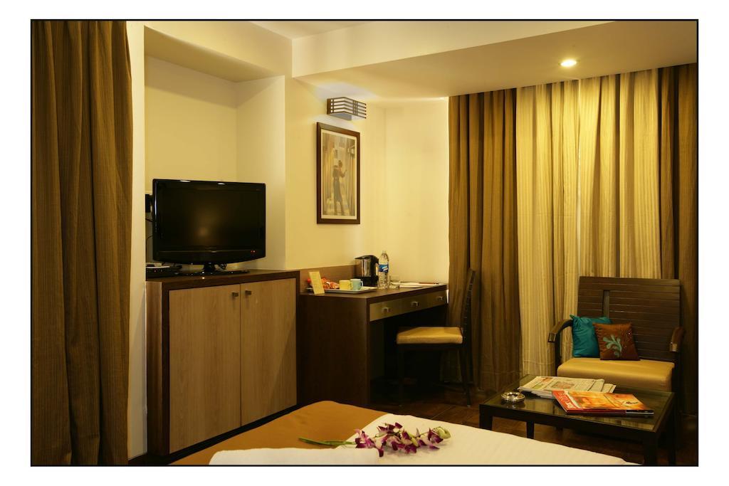 Hotel Utsav Deluxe Pune Habitación foto